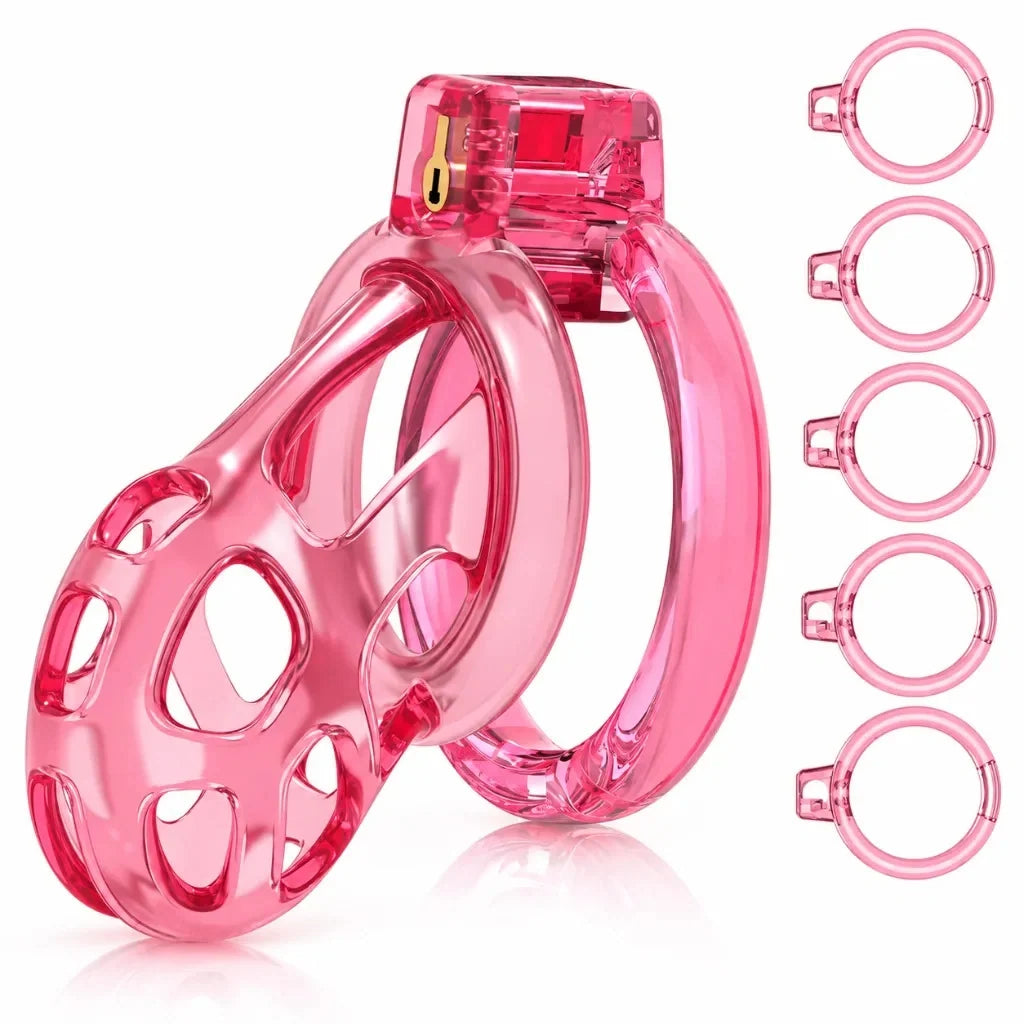 Pink Super Soft Cobra Chastity Cage with a base ring and five additional ring options on a white background