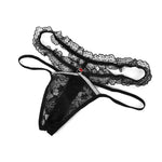 Black rhinestone-style lace thong, flat lay