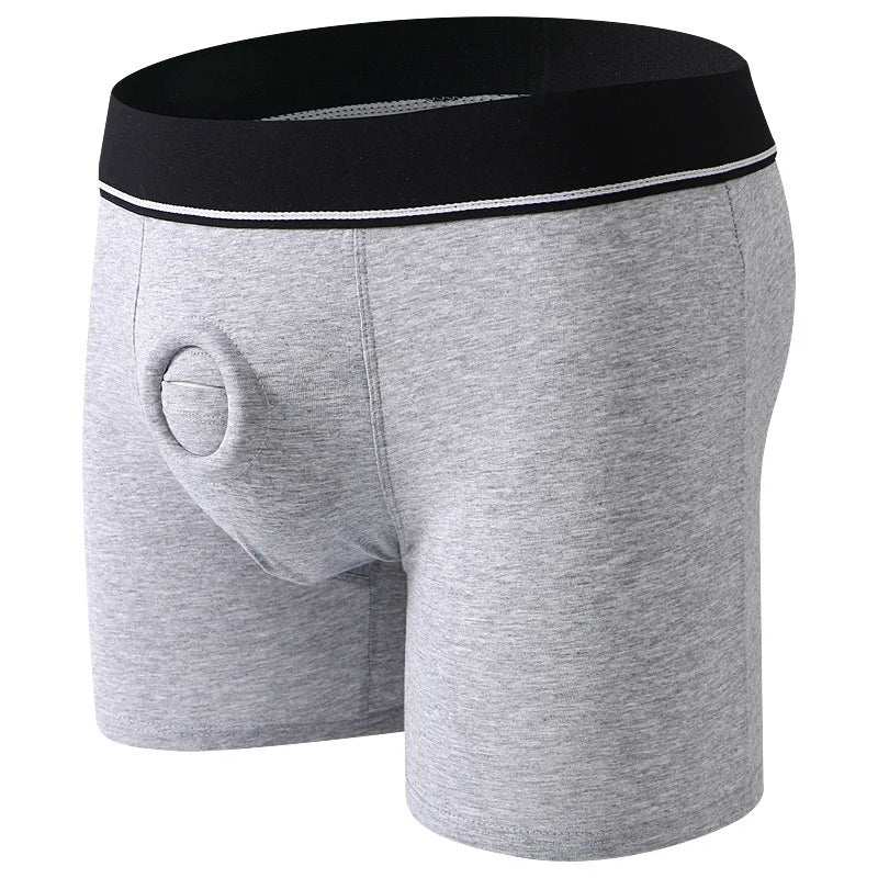 Gray boxer briefs with a black waistband on a white background for pegging your sub