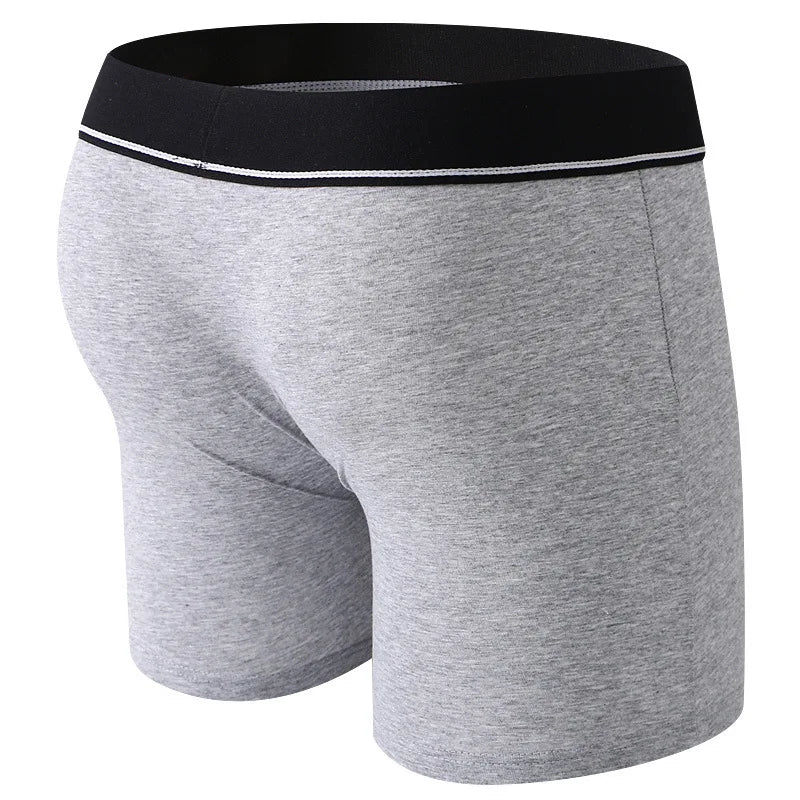 Grey boxer strap-on briefs for pegging with a white waistband on a white background
