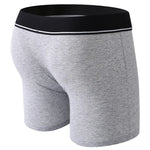 Grey boxer strap-on briefs for pegging with a white waistband on a white background