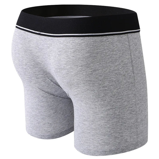Grey boxer strap-on briefs for pegging with a white waistband on a white background