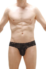 Men's black thong with a lace waistband and net panel.